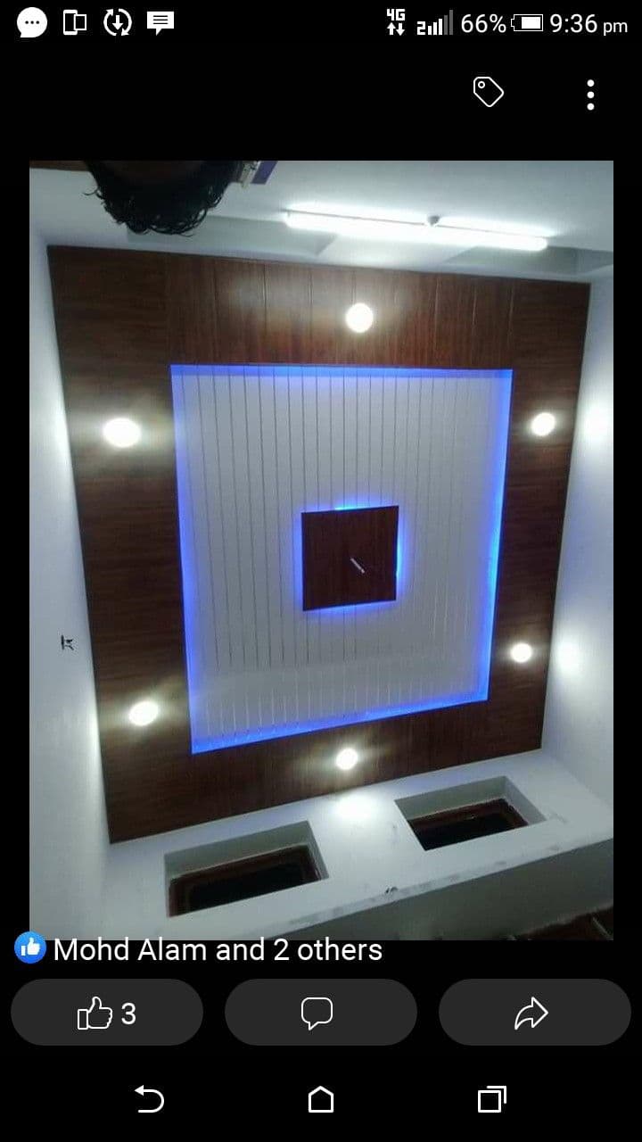 PVC panel ceiling with wood-tone finish and blue LED lighting, Chandigarh false ceiling work
